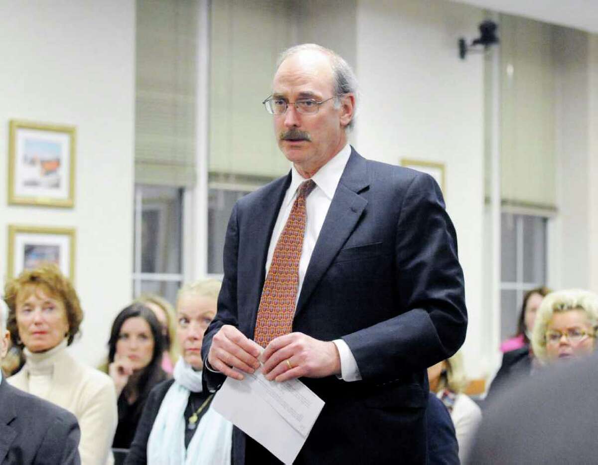 Greenwich attorney Thomas Heagney, standing in front of the Greenwich Planning and Zoning Board of Appeals, asks for and is granted a continuance in the matter of the controversial home construction project at 38 Bush Ave. in the Belle Haven section of Greenwich that is linked to Irish developer Sean Dunne, Wednesday night, Feb. 23, 2011, at Greenwich Town Hall.