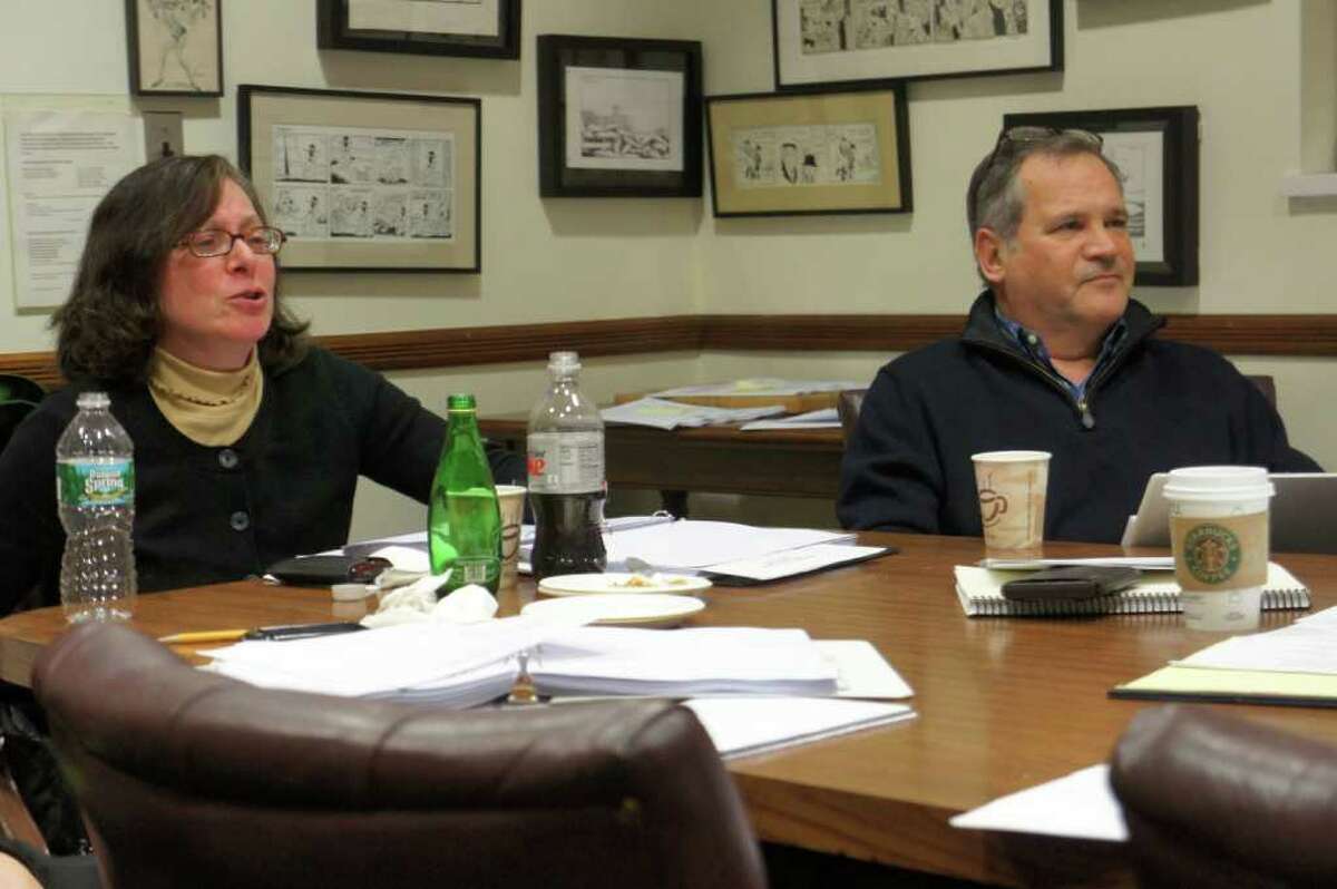 Board of Finance Chairwoman Helen Garten discusses the town's budget with fellow board member Brian Stern and other town officials during a budget workshop on Monday, Feb. 14, 2011 at Town Hall.