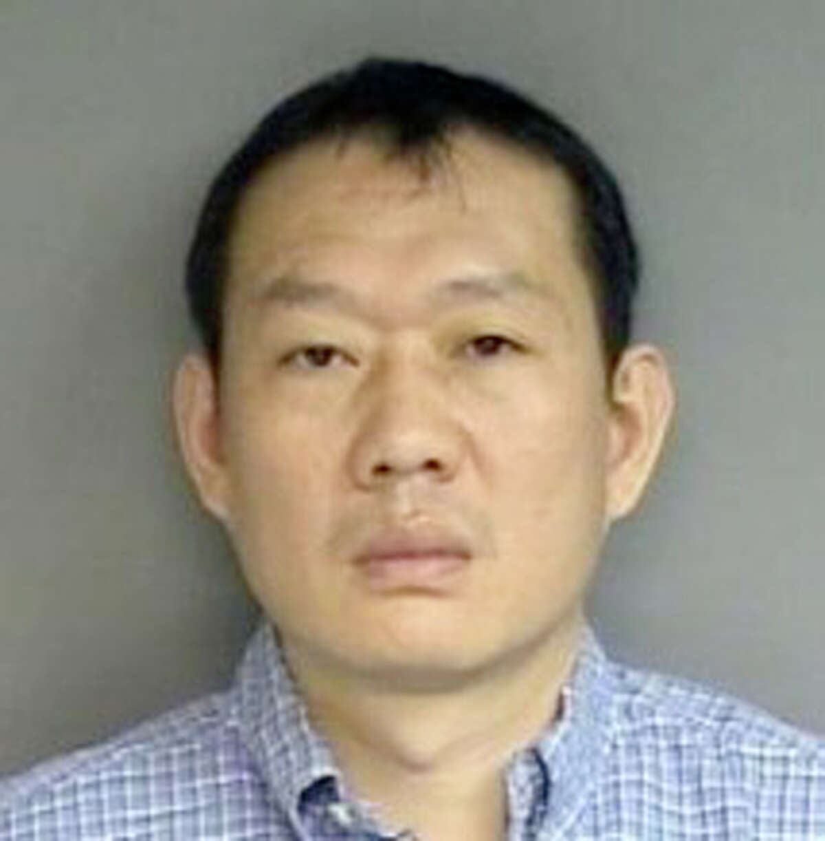 Stamford Police Department booking photo of Guangfu Zhao.