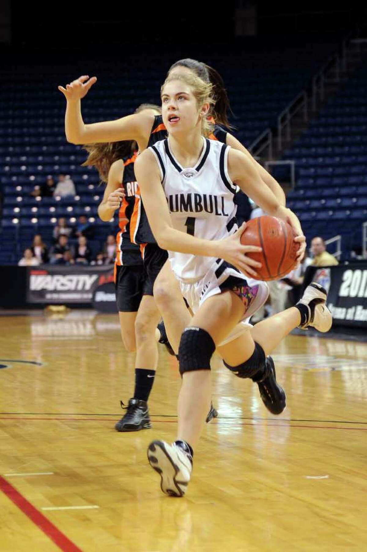 Trumbull's Alexa Pfohl dribbles the ball during Thursday's FCIAC girls basketball championship game at Webster Bank Arena at Harbor Yard on February 24, 2011. Pfohl was named Most Valuable Player after the game.