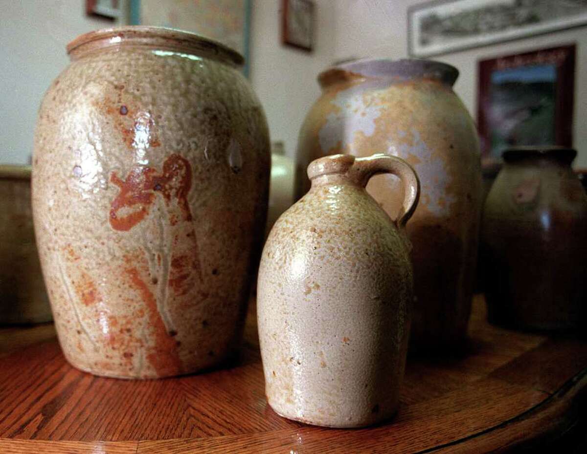 These are some of the Wilson Pottery pieces in Richard Kinz’s collection. He volunteers much of his time to excavating the Wilson property and helping create a museum to display it. (Krista Niles/Special to the Express-News)