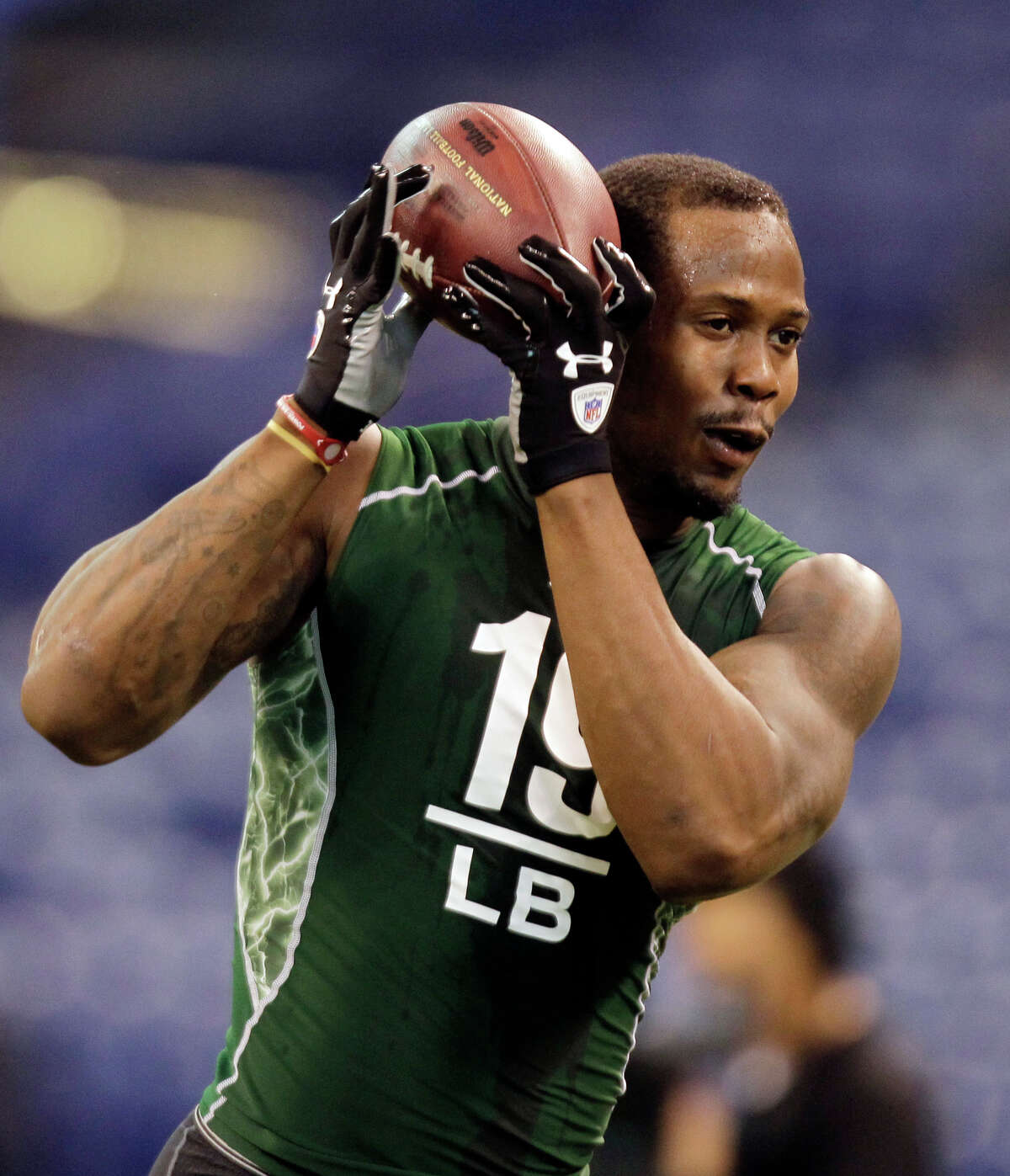 Texas A&M linebacker Von Miller makes a catch at the NFL Scouting Combine in Indianapolis on Monday.