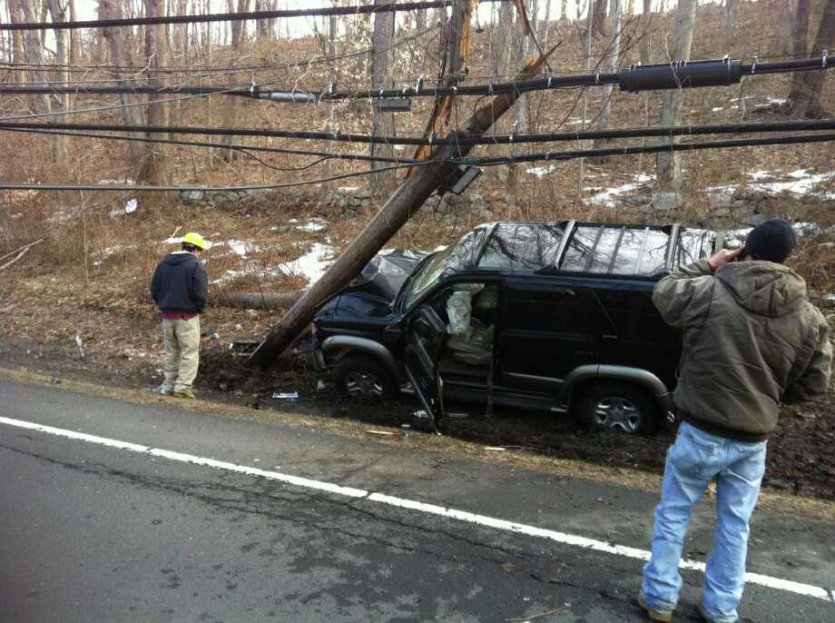 Long Ridge road shut down after car hits utility pole StamfordAdvocate