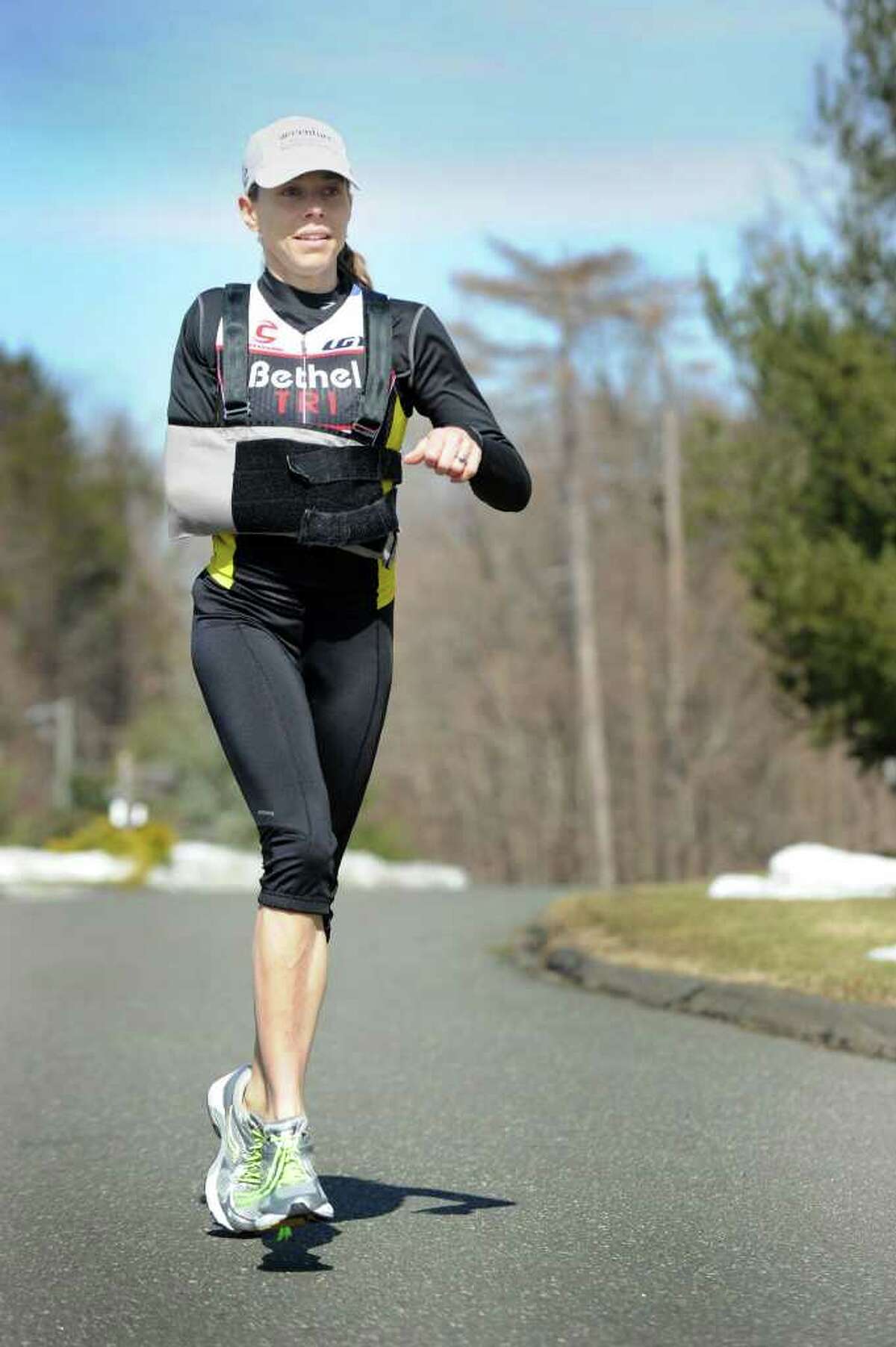 Robin Caruso of Ridgefield is a triathlete. The mother of three was hit by a car and lost the use of her right arm. Photo taken Wednesday, March 2, 2011.