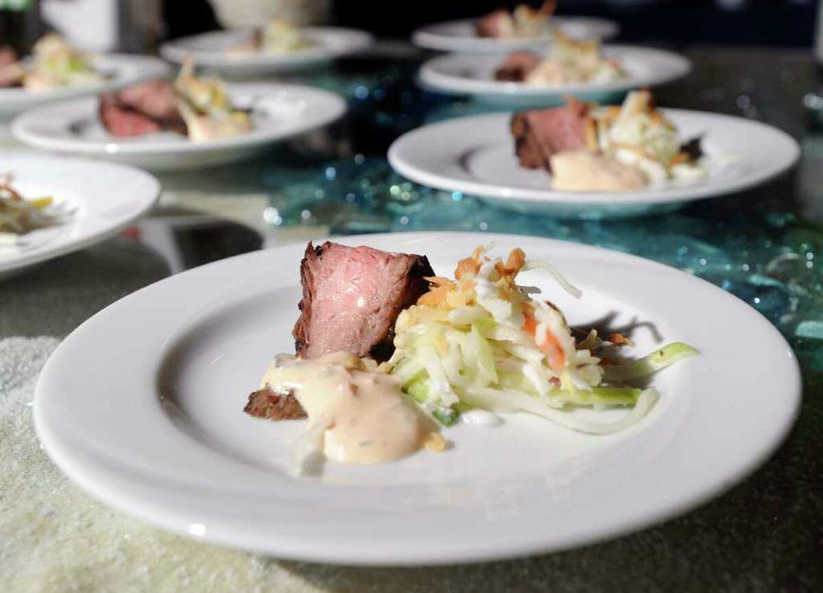 Flank Steak with Coconut Coleslaw and Jamaican Herb Dip by Fjord Catering of Stamford on display during the 26th annual Great Chefs at Hyatt Regency Greenwich, Friday night, March 4, 2011.