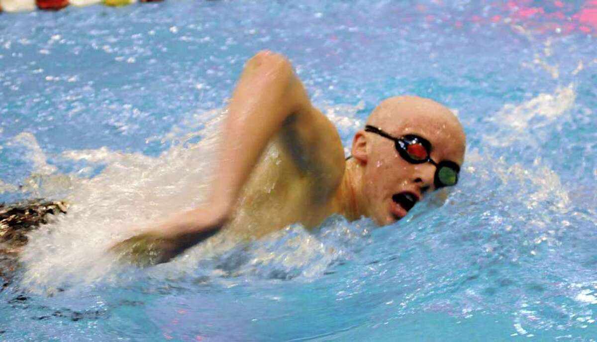 Chris Mulhall swims for Pomperaug High School at the Boys SWC Swimming championships held at Masuk High School in Monroe on Friday Mar. 4, 2011.
