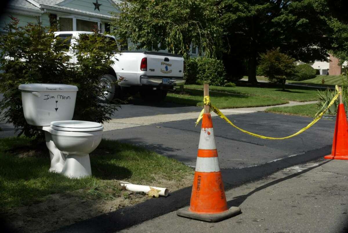 The Town of Stratford repaired snowplow damage to Grant Dalling's driveway on Bunnyview Drive, monday, Sept. 14.The toilet still remains in the driveway a silent protest to the Mayor and other Stratford officials.