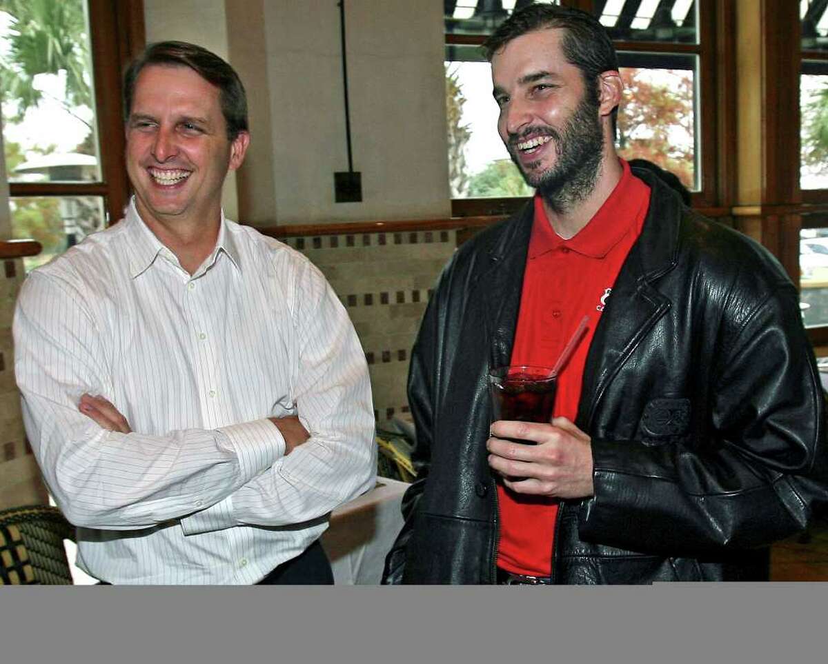 Sports Ty Detmer (left) and Koy Detmer greet members of the media at a lucheon at Reggiano's Wednesday to announce the opening of their new workout center. Ty Detmer and Koy Detmer at Reggiano's restaurant with Earl Campbell, Jesse James Leija. Announcing Triton Sports Center. Tom Reel/Staff December 12, 2007.