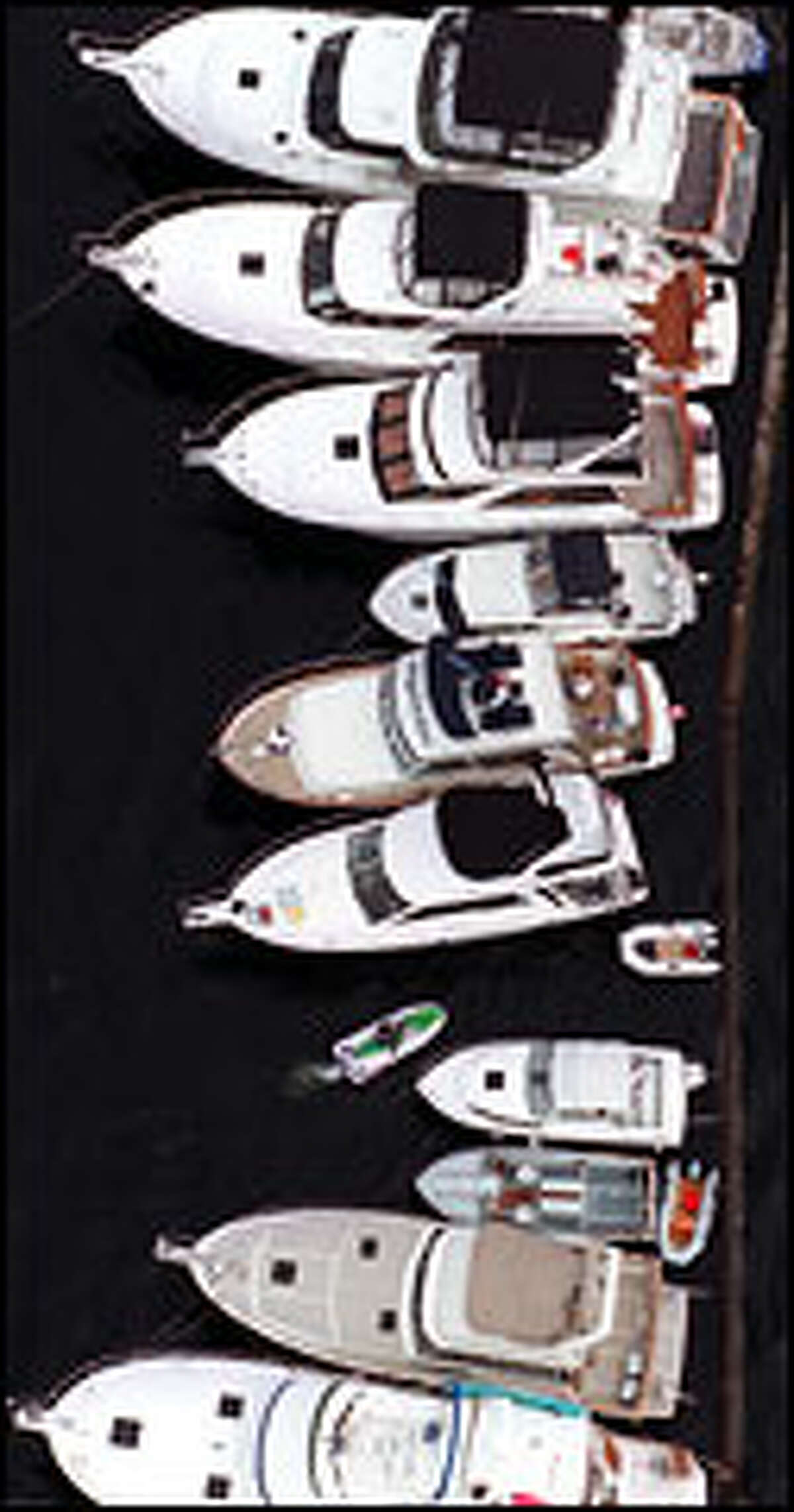 Boats squeeze in along the Montlake Cut; parking is difficult everywhere in Seattle, even on the water.