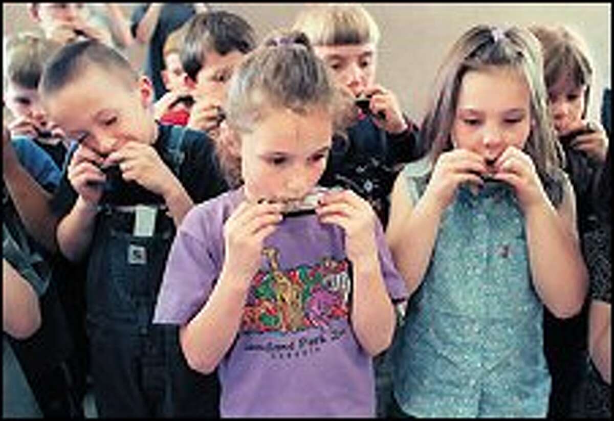 Music man passes on secrets of the harmonica