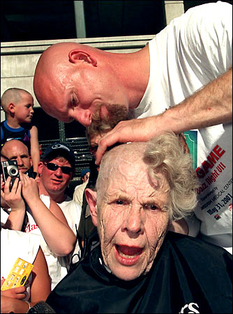 One of the greatest baseball promotions: Watch Jay Buhner shave heads for  'Buzz Cut Night