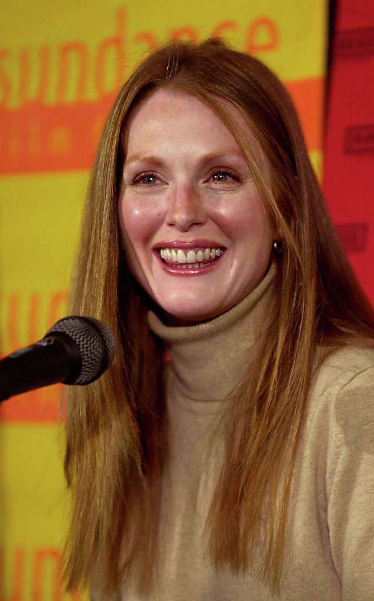 ** FILE ** Actress Julianne Moore answers questions during a news conference at the Sundance Film Festival in Park City, Utah, in this Jan. 20, 2001, file photo. Moore will receive the actor award at the 2002 Gotham Awards, given out by the Independent Feature Project, on Sept. 26. The award honors a New York actor who has made significant contributions to the city's film community.