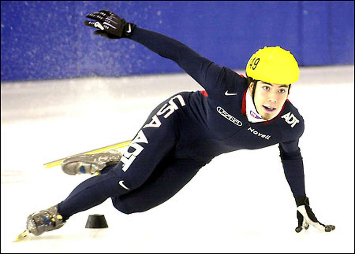 Apolo Anton Ohno of Seattle skates during the men’s four-lap race at the United States Olympic speedskating trials in Kearns, Utah. Ohno won the race and has qualified for all short-track events at the Salt Lake Games.