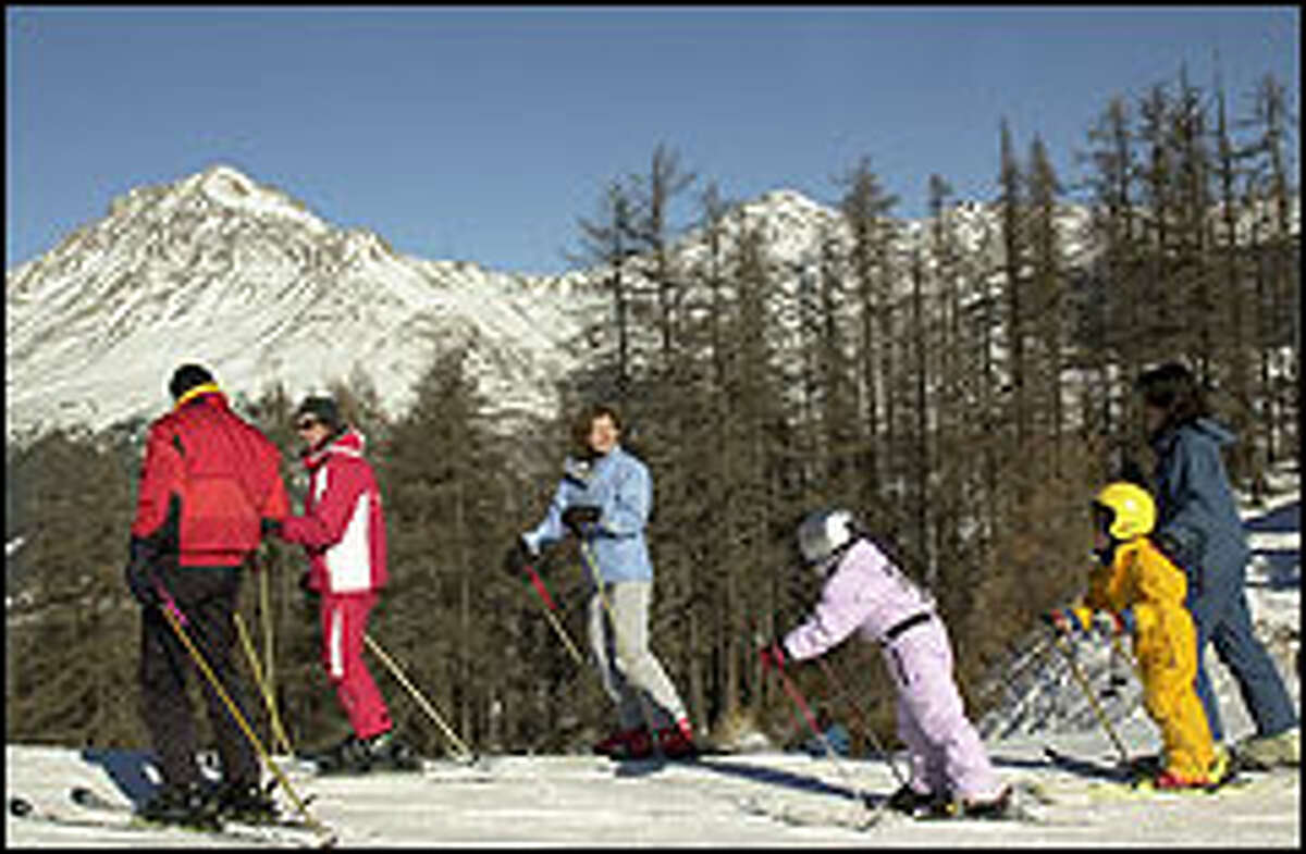 Skiers prepare to descend the slopes at Serre Ratier. There are plenty of activities for non-skiers as well, including ice skating, indoor swimming, fitness facilities, entertainment programs and movies.