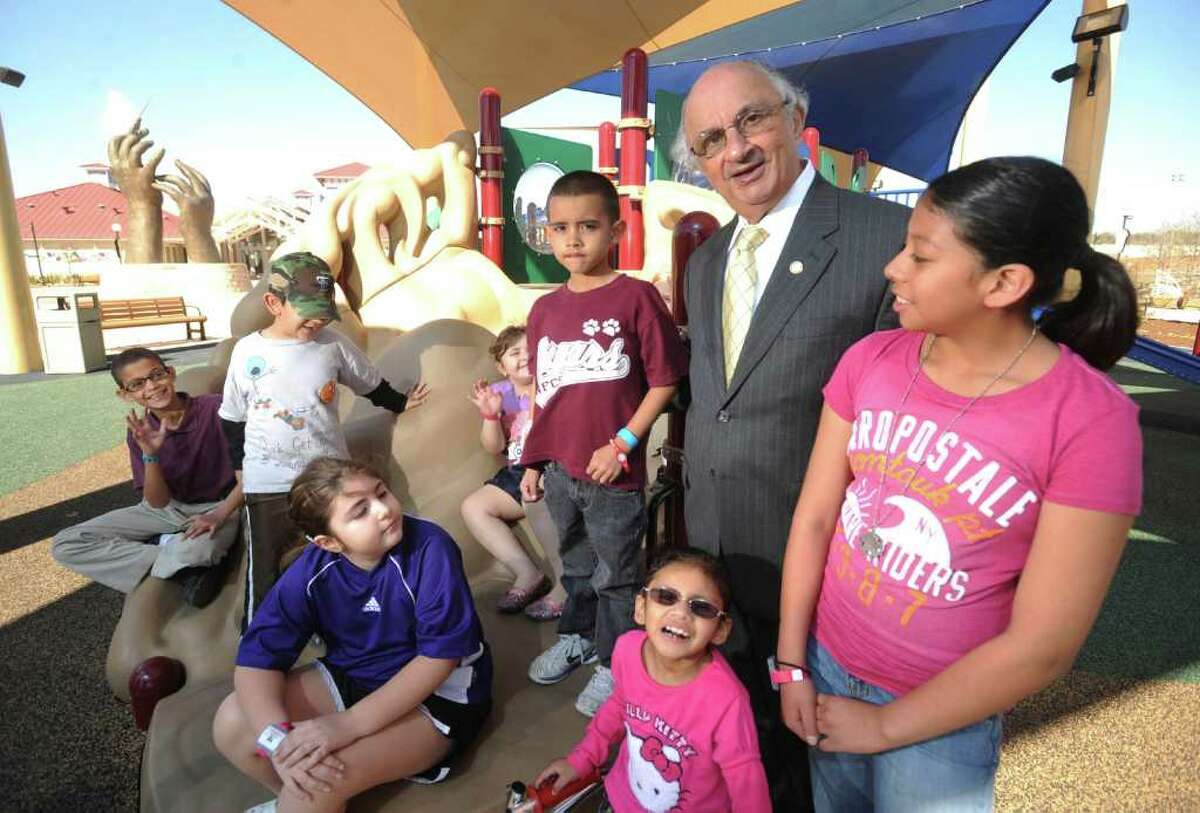Philanthropist Harvey Najim poses with children at Morgan's Wonderland, a family fun park in San Antonio. For Najim, early education is a particular passion: “That's where the need is the greatest.”