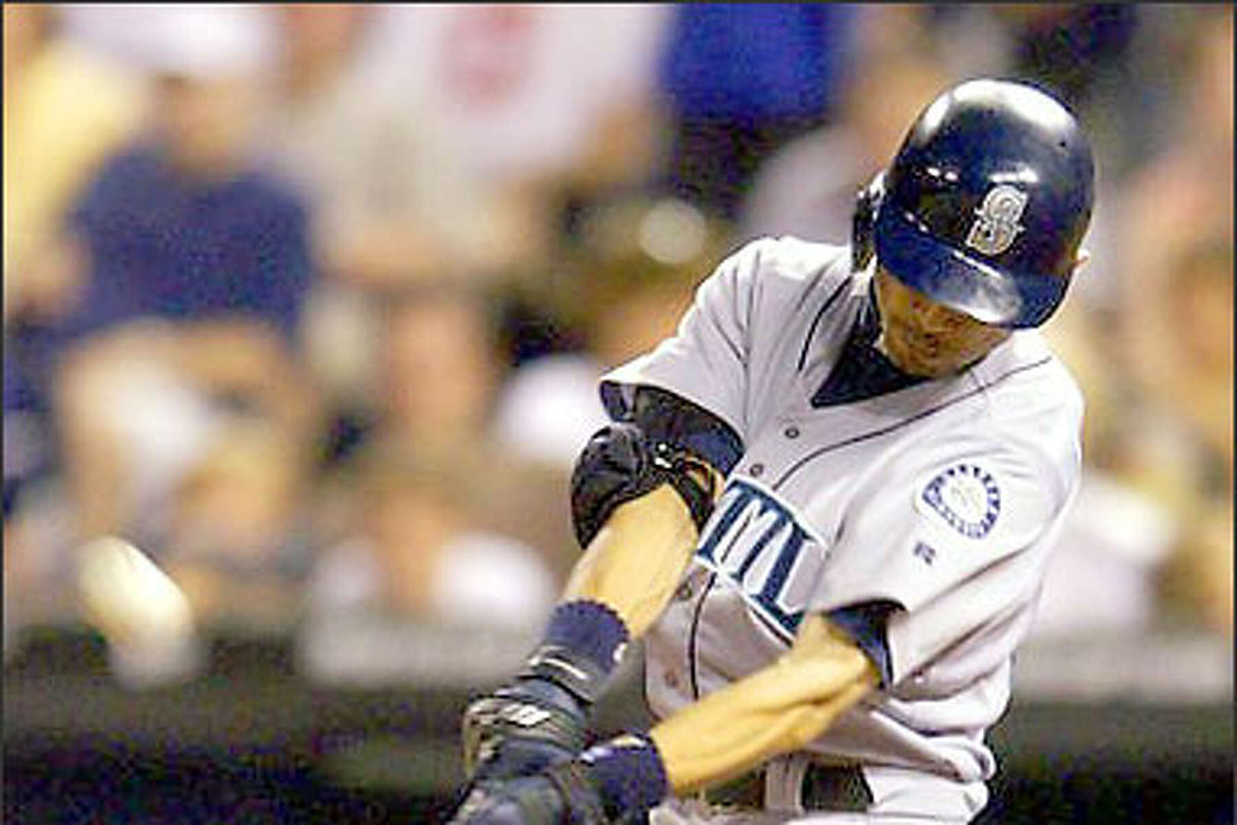 Seattle Mariners, from left, Dan Wilson, Ichiro Suzuki, Raul