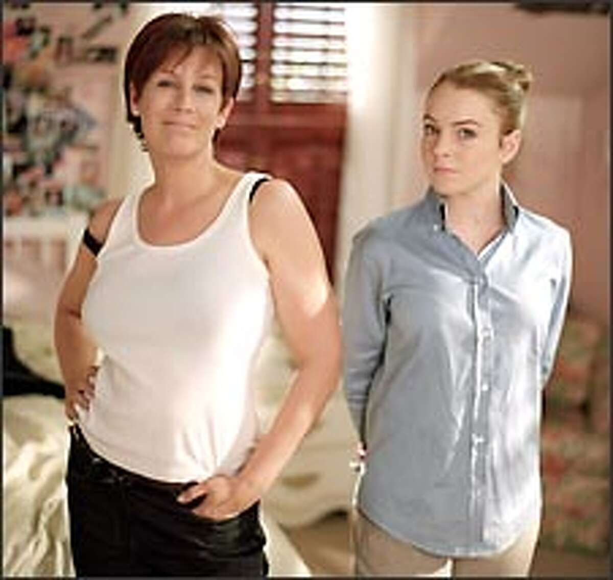 Anna (Lindsay Lohan, right) and her mom Tess (Jamie Lee Curtis) magically switch bodies in "Freaky Friday."