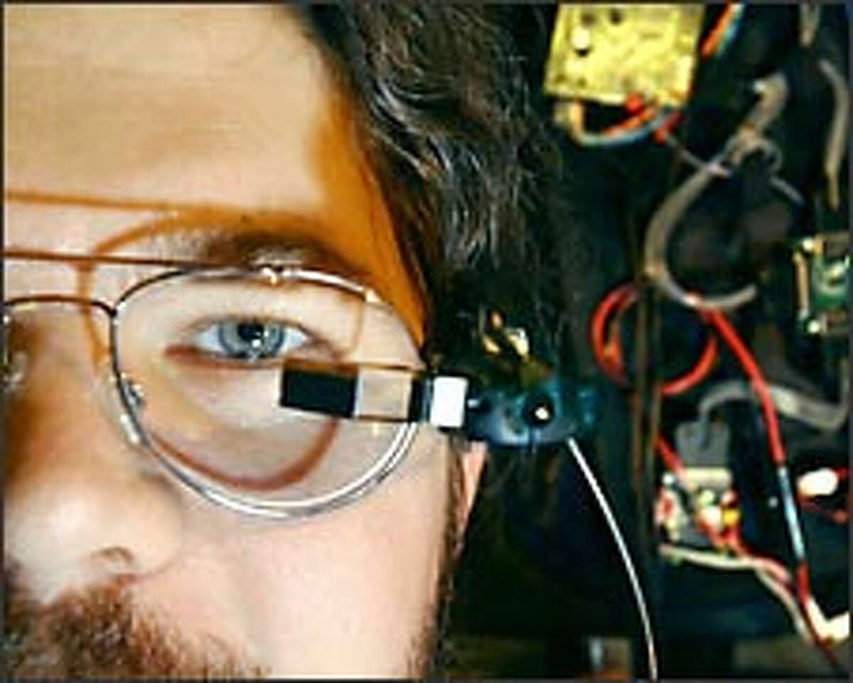 Richard DeVaul hopes his tiny eyeglasses-mounted computer display can help wearers remember names and tasks.