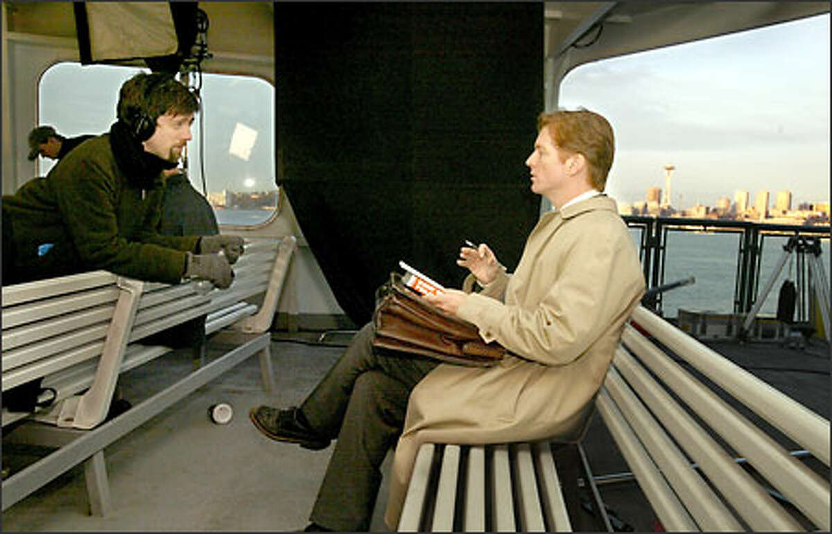 Filmmaker John Helde, left, and Eric Stoltz on the ferry M/V Kaleetan.