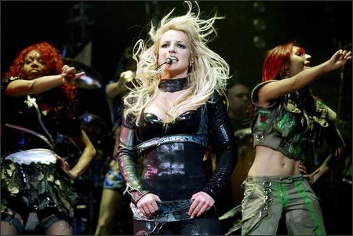 Britney Spears performs with her dancers. See more photos from the show.