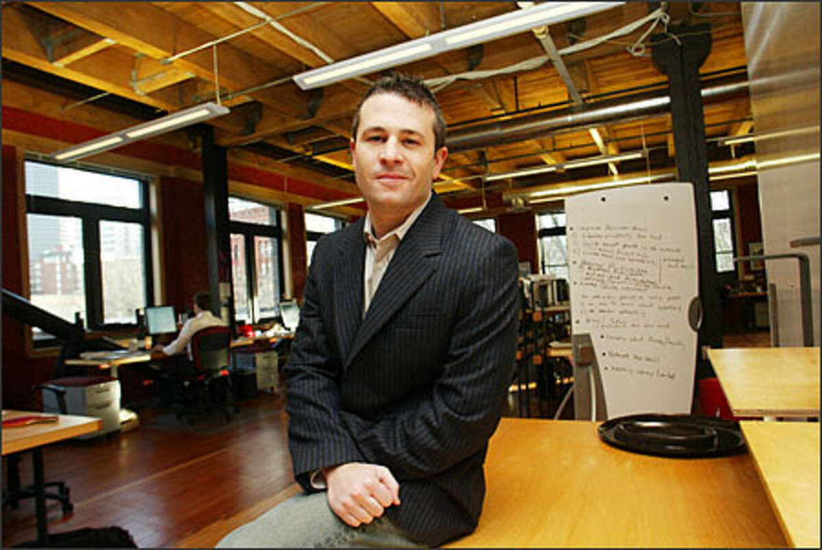 Jason Goldberg, chief Jobster, in his Pioneer Square offices. His company is taking a different look at the way people are recruited for jobs.