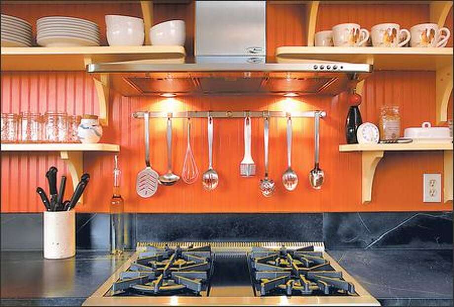 Smart Solutions For Small Es Seattlepi Pumpkin Color Paint Infuses The Queen Anne Kitchen Of Carina Langstraat And Erik Wood With