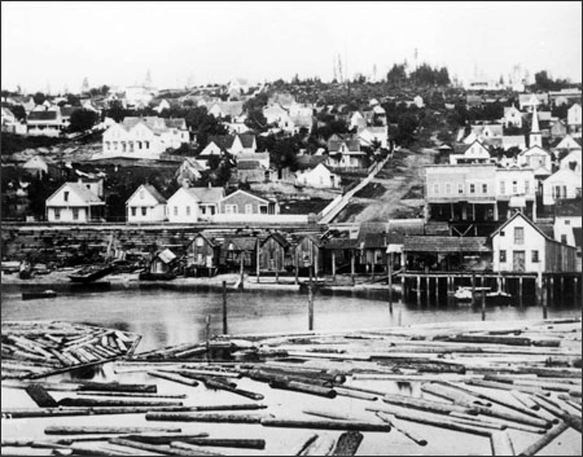 The view from Yesler's Wharf, photographed circa 1878.