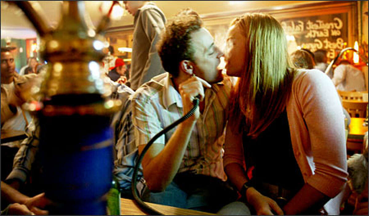 Passing the pipe, Middle Easternstyle, is catching on in Seattle