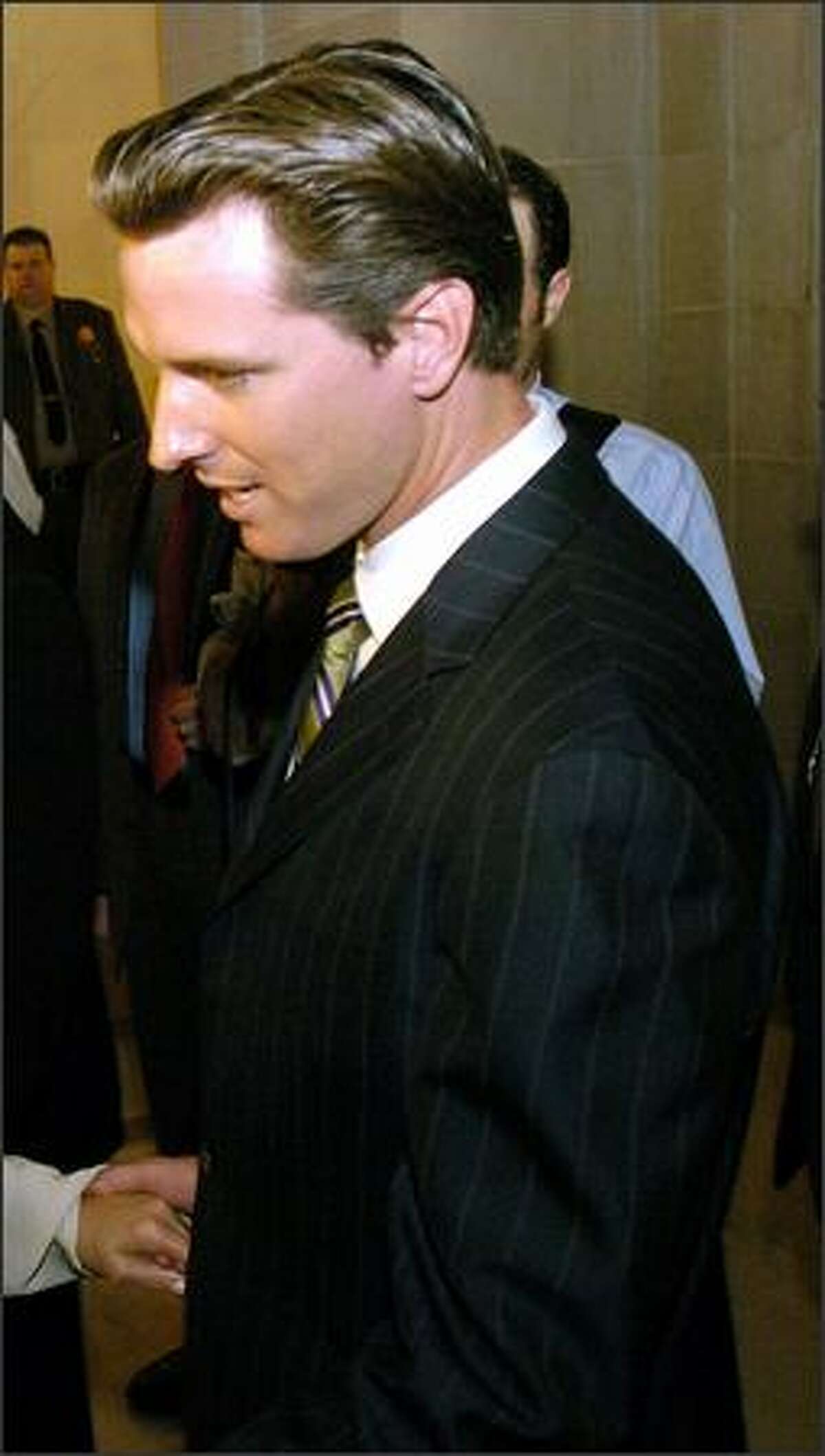 Pali Cooper, left, and her partner, Jeanne Rizzo, speak with San Francisco Mayor Gavin Newsom on Thursday, March 11, 2004, in San Francisco. Rizzo and Pali missed being allowed to be wed by 10 minutes. The debate over whether same-sex couples are entitled to the right to marry moves back to a California courtroom on Wednesday, Dec. 22, 2004. Rizzo and Cooper are among the 12 same-sex Bay Area couples who filed lawsuits after the California Supreme Court ordered city officials to stop issuing marriage licenses to gay and lesbian couples. (AP Photo/Noah Berger)