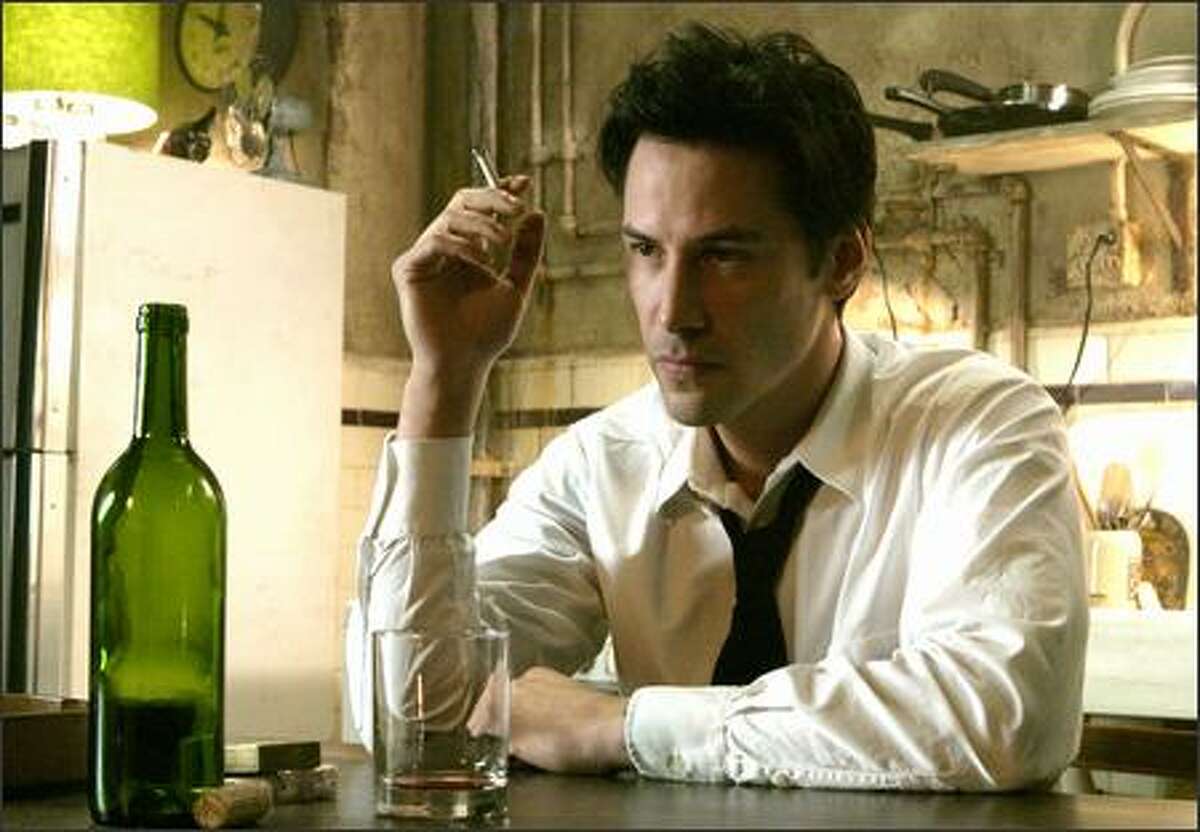 Keanu Reeves as the very antiheroic John Constantine -- an embittered, hard-living con man and magician who saves others while knowing salvation is closed to him -- in "Constantine," a live-action adaptation of the long-running DC/Vertigo horror comic, "Hellblazer."
