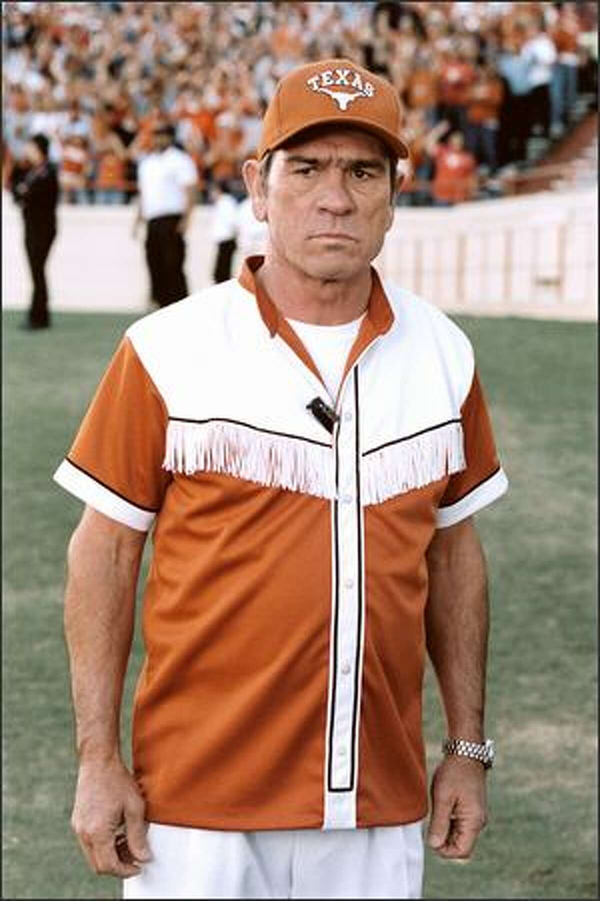 Tommy Lee Jones stars as by-the-book Texas Ranger Roland Sharp, who is assigned to protect the only witnesses to a crime -- a group of University of Texas cheerleaders -– by going undercover and moving in with the five uncontrollable coeds.