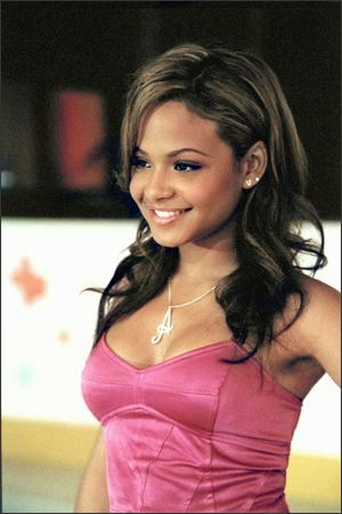 Christina Milian plays cheerleading captain Anne. Milian, of Cuban-American heritage, has guest-starred on such TV sitcoms as "The Steve Harvey Show," and earned small roles in such films as "The Wood" and "American Pie." She is also an accomplished recording artist.