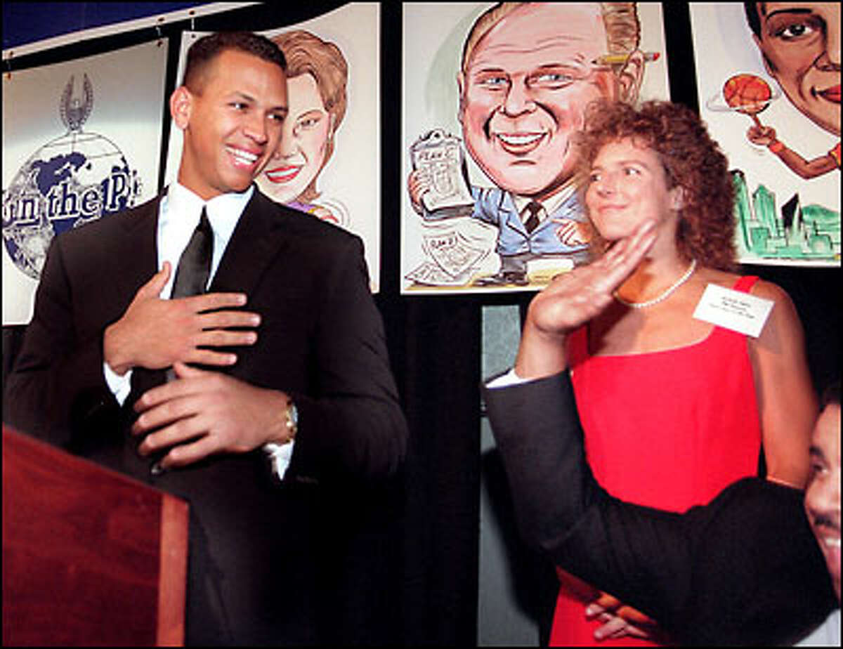 1997: Alex Rodriguez and U.S soccer star Michelle Akers share the podium after receiving their awards as P-I sports stars of the year.