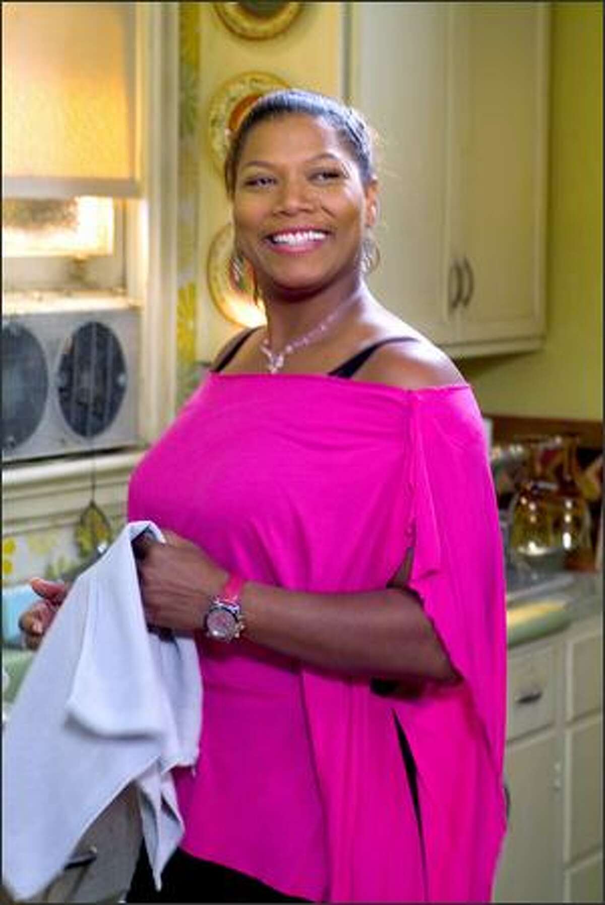 Queen Latifah plays Gina Norris, a hair stylist who risks it all to buy a rundown beauty shop in Atlanta.