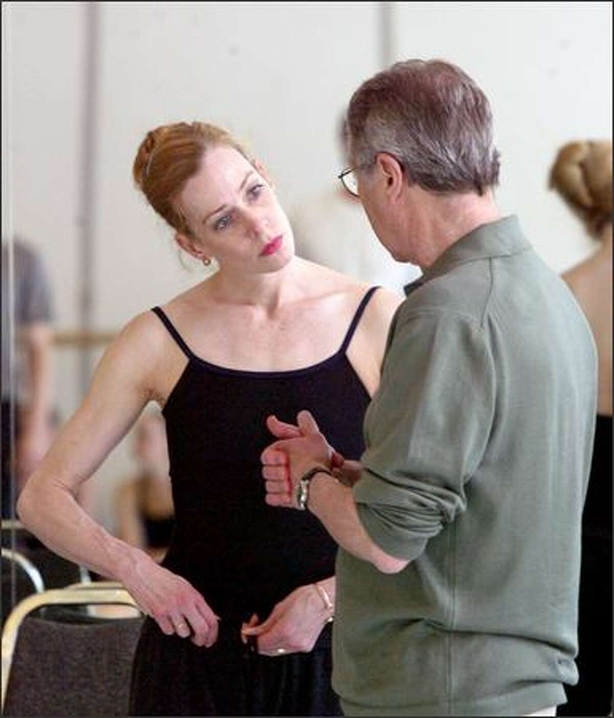 Principal dancer Patricia Barker listens to directions from Kent Stowell during a rehearsal for "Silver Lining."