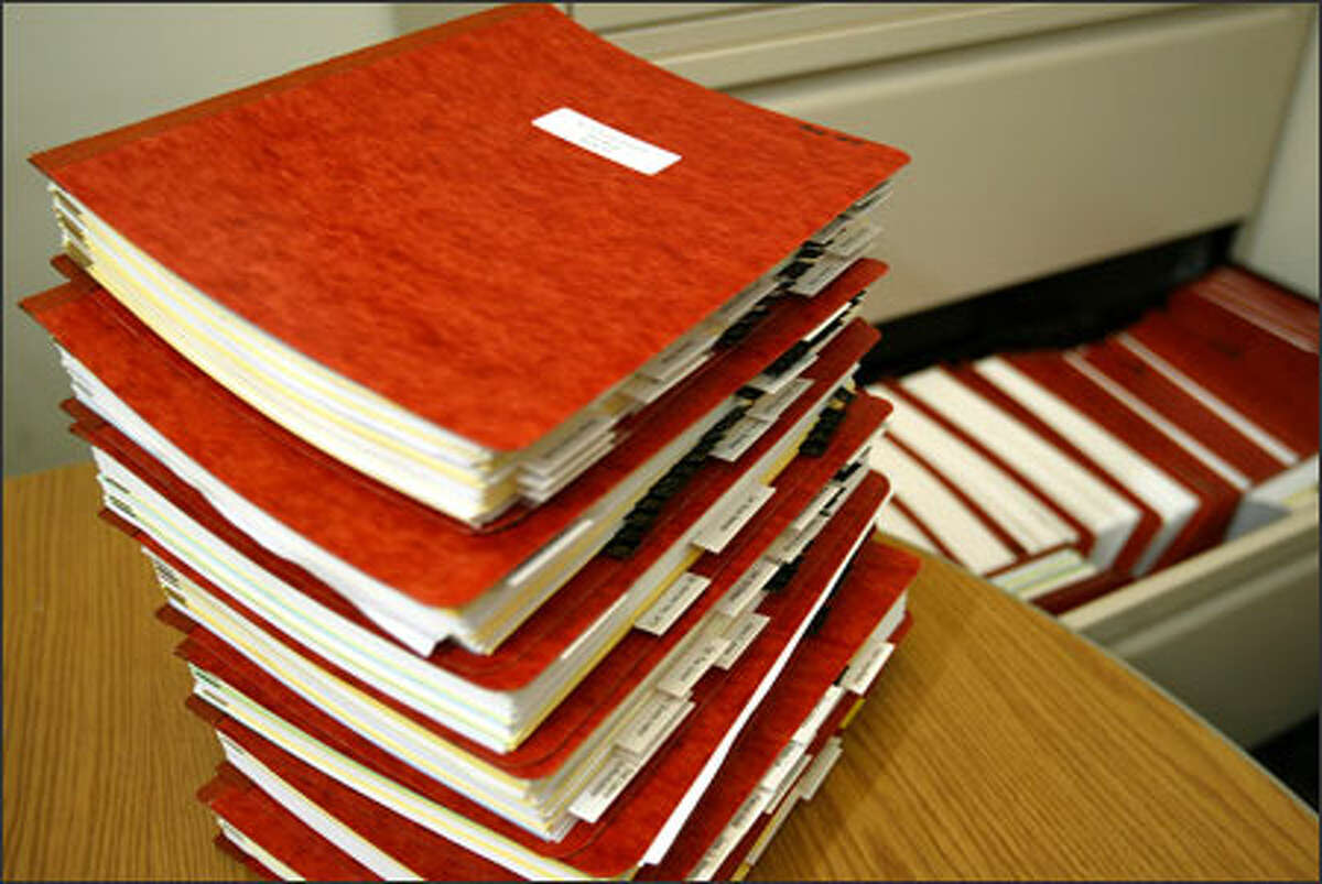 Former Sheriff's Deputy Dan Ring faced two internal investigations and a criminal inquiry, which produced this stack of files in the Sheriff's Office. The Seattle Police Department and the FBI assisted. Ring walked away nearly unscathed.