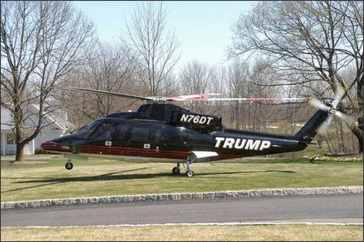 Donald Trump's private helicopter delivers the master to Trump National Golf Course.