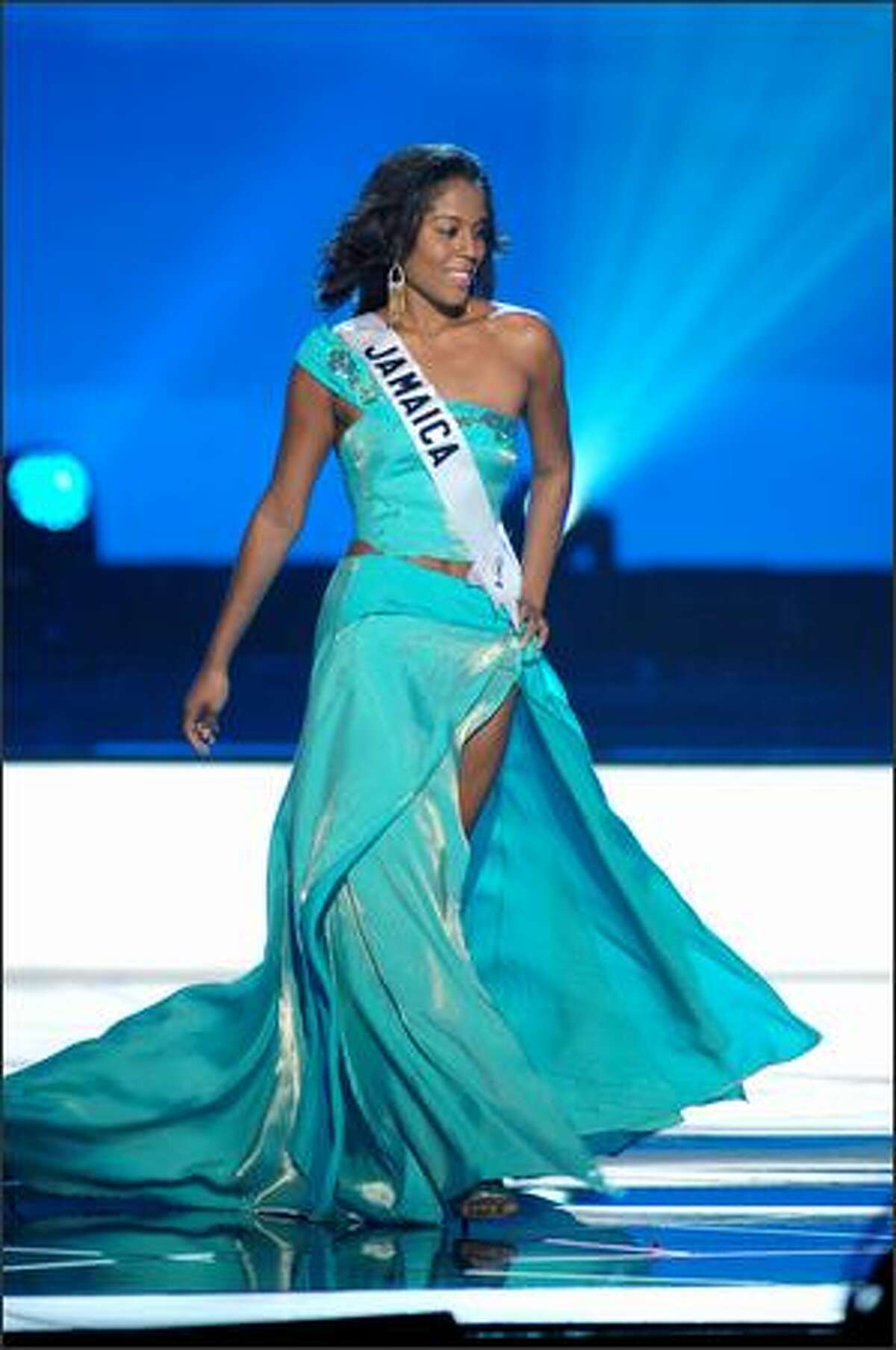 Raquel Wright, Miss Jamaica, competes in an evening gown of her choice during the 2005 Miss Universe Presentation Show at Impact Arena, Exhibition and Convention Center in Bangkok, Thailand on May 26. During the presentation show, each contestant was judged by a preliminary panel of six judges in swimsuit and evening gown categories, after two days of one-on-one interviews. The scores will be tallied and the top 15 contestants will be announced during Monday's telecast (NBC, tape-delayed to 9 p.m. PDT), at the conclusion of which a winner will be crowned.
