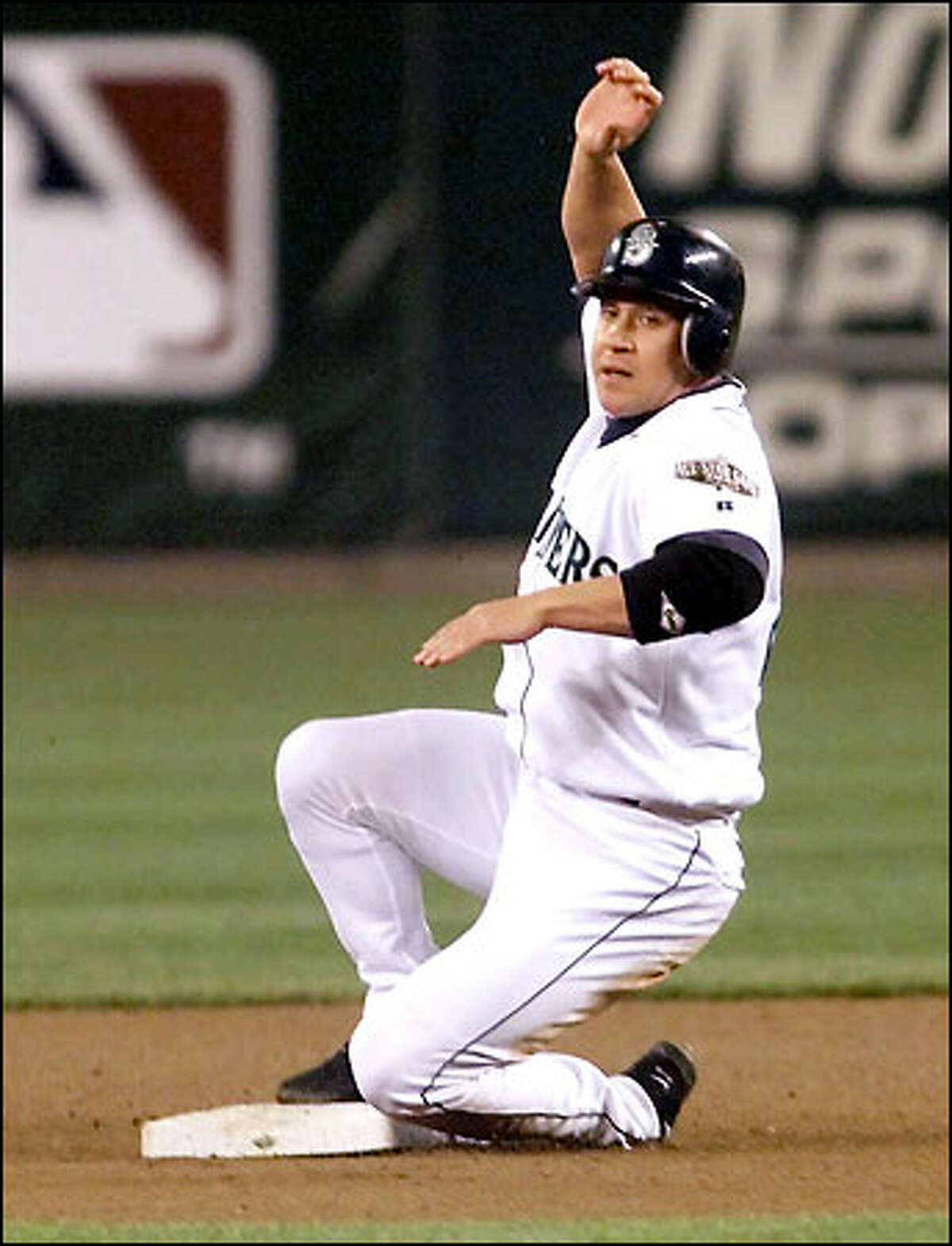 Bret Boone, running on a 3-2 pitch to Mike Cameron in the fourth inning, looks to see that ball four was called. Boone was in the lineup as the DH.