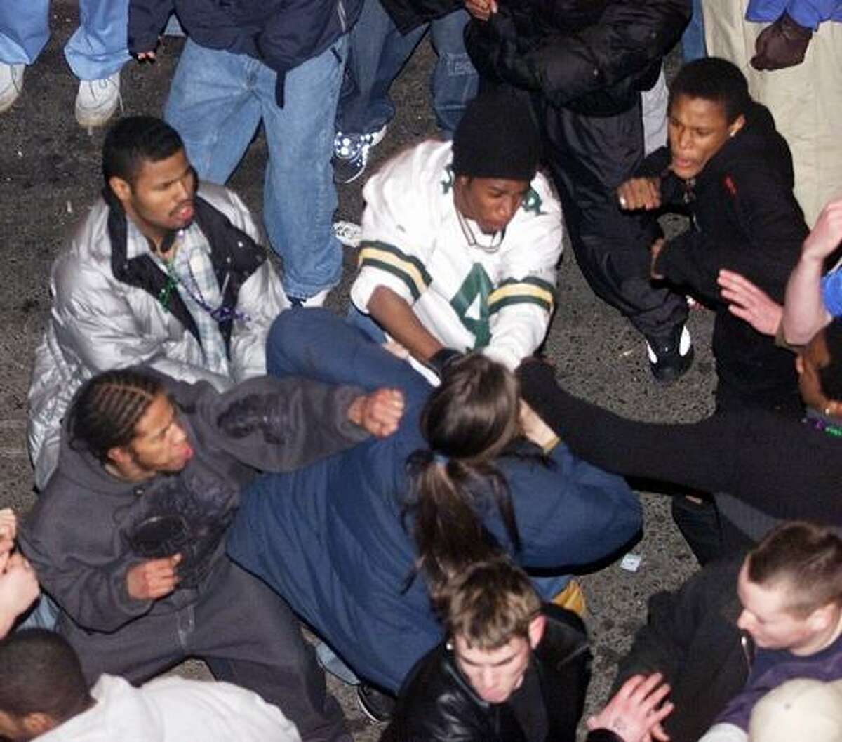 A group of young men beat another man in Pioneer Square as Fat Tuesday celebrations came to a close.