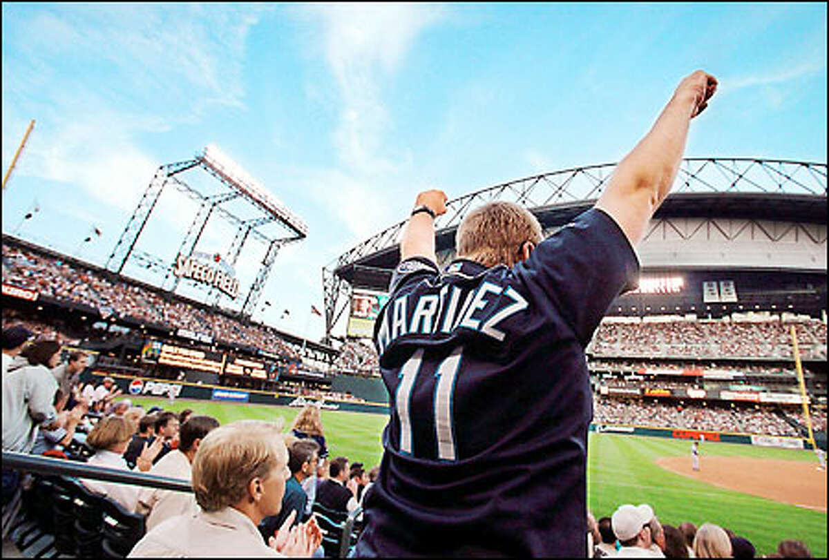 Seattle fans, such as Jim Goodman of Newcastle, get to revel in the ulitmage "fans' game" Tuesday at Safeco Field.