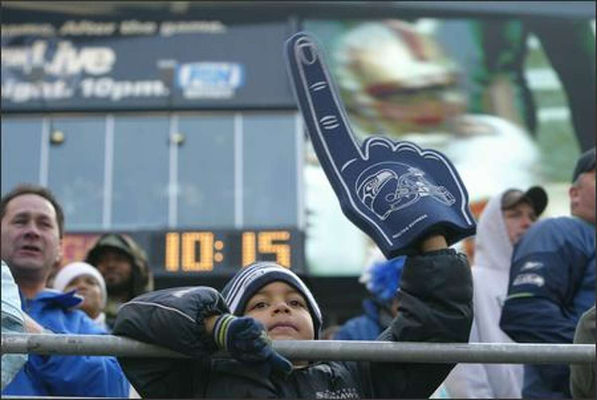 Seahawks fan Zyion Handburgh, 6, cheers the team on during the game against San Francisco.
