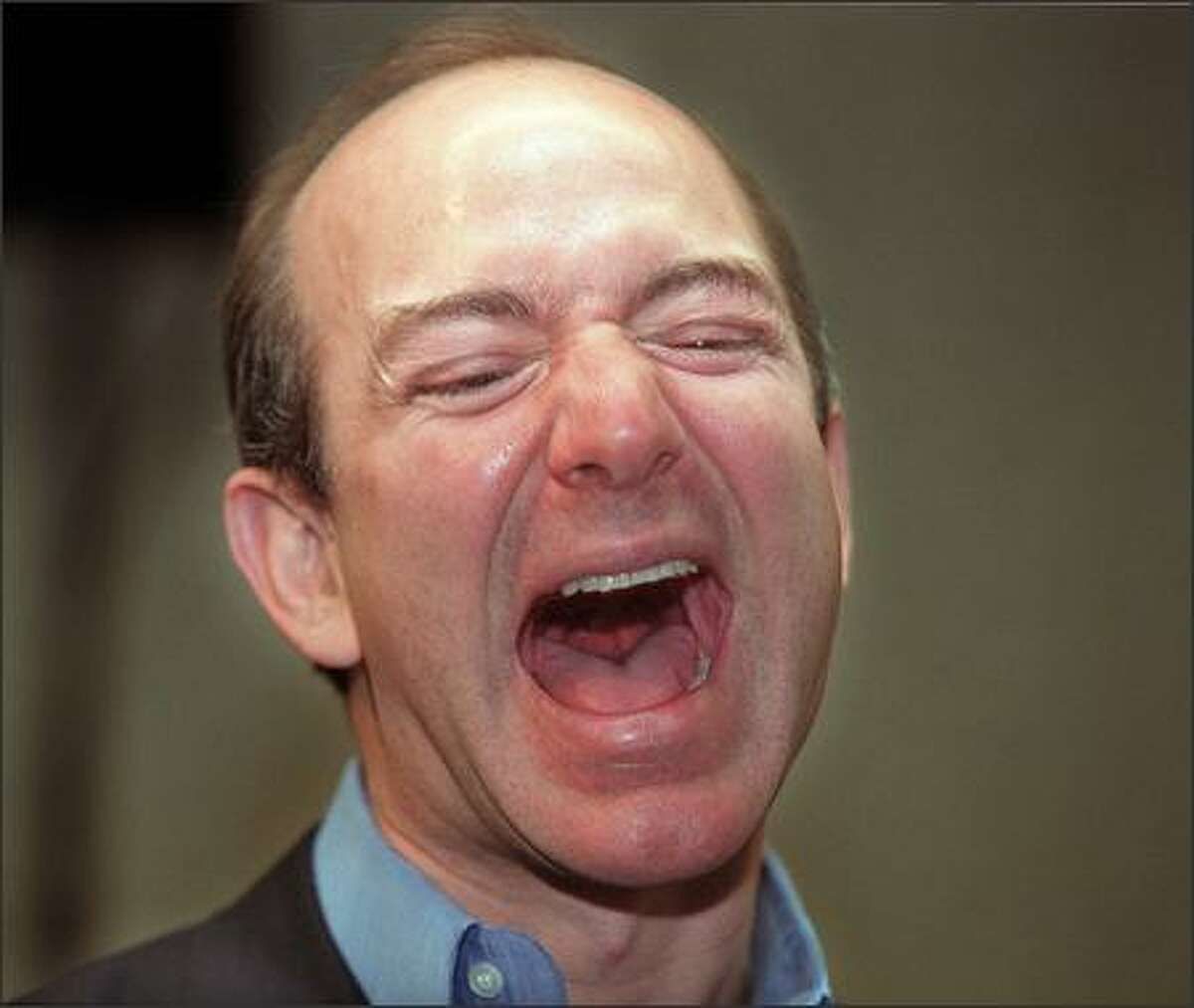 Jeff Bezos, chairman of Amazon.com, delivers his trademark laugh after the annual shareholders meeting.