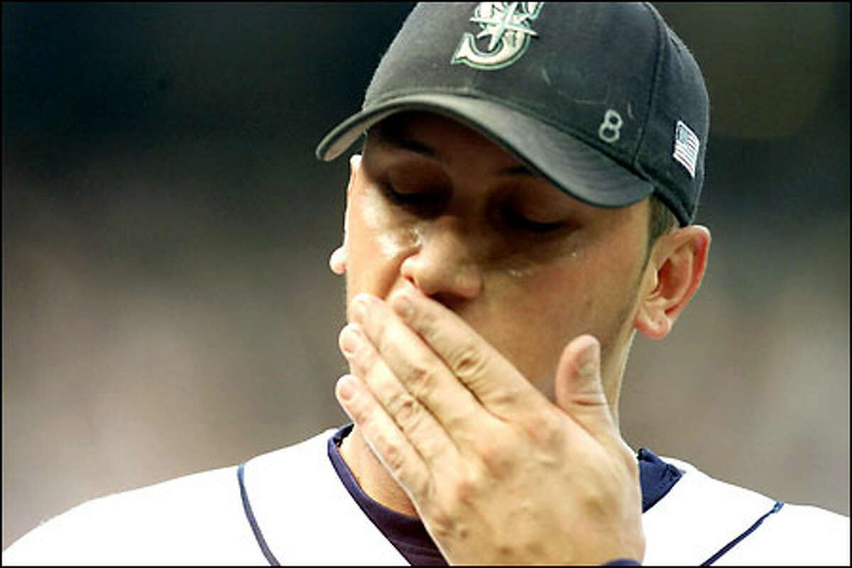 Freddy Garcia reacts after giving up three runs in the forth inning.