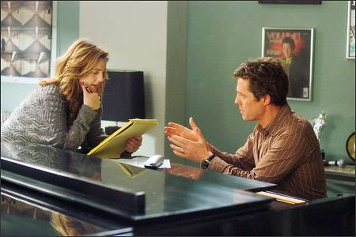 Drew Barrymore stars as Sophie Fisher and Hugh Grant stars as Alex Fletcher in Warner Bros. Pictures' and Village Roadshow Pictures' romantic comedy "Music and Lyrics," distributed by Warner Bros. Pictures.