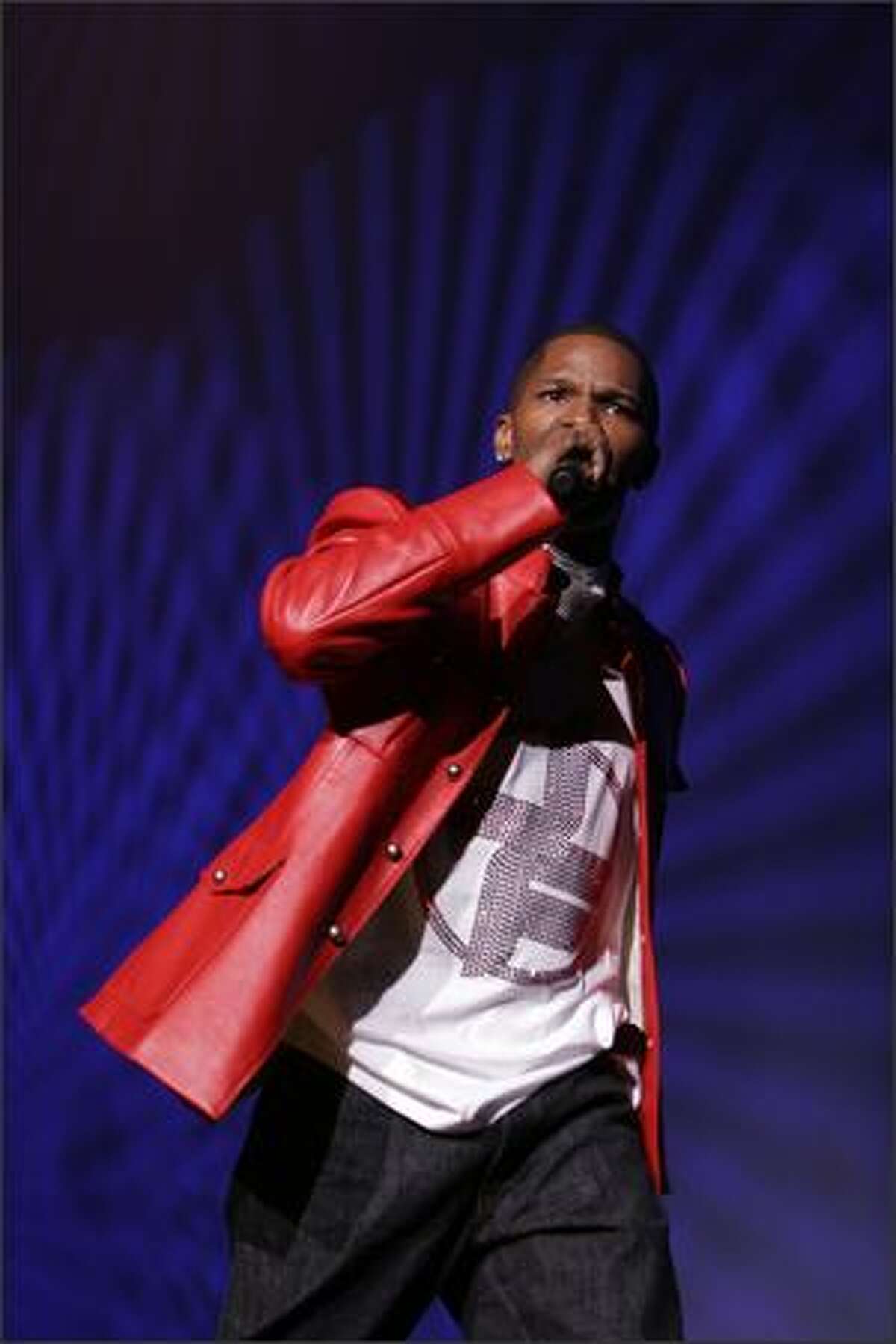Jamie Foxx begins his concert with at KeyArena with a comedy routine. He played Seattle as part of his Unpredictable Tour.