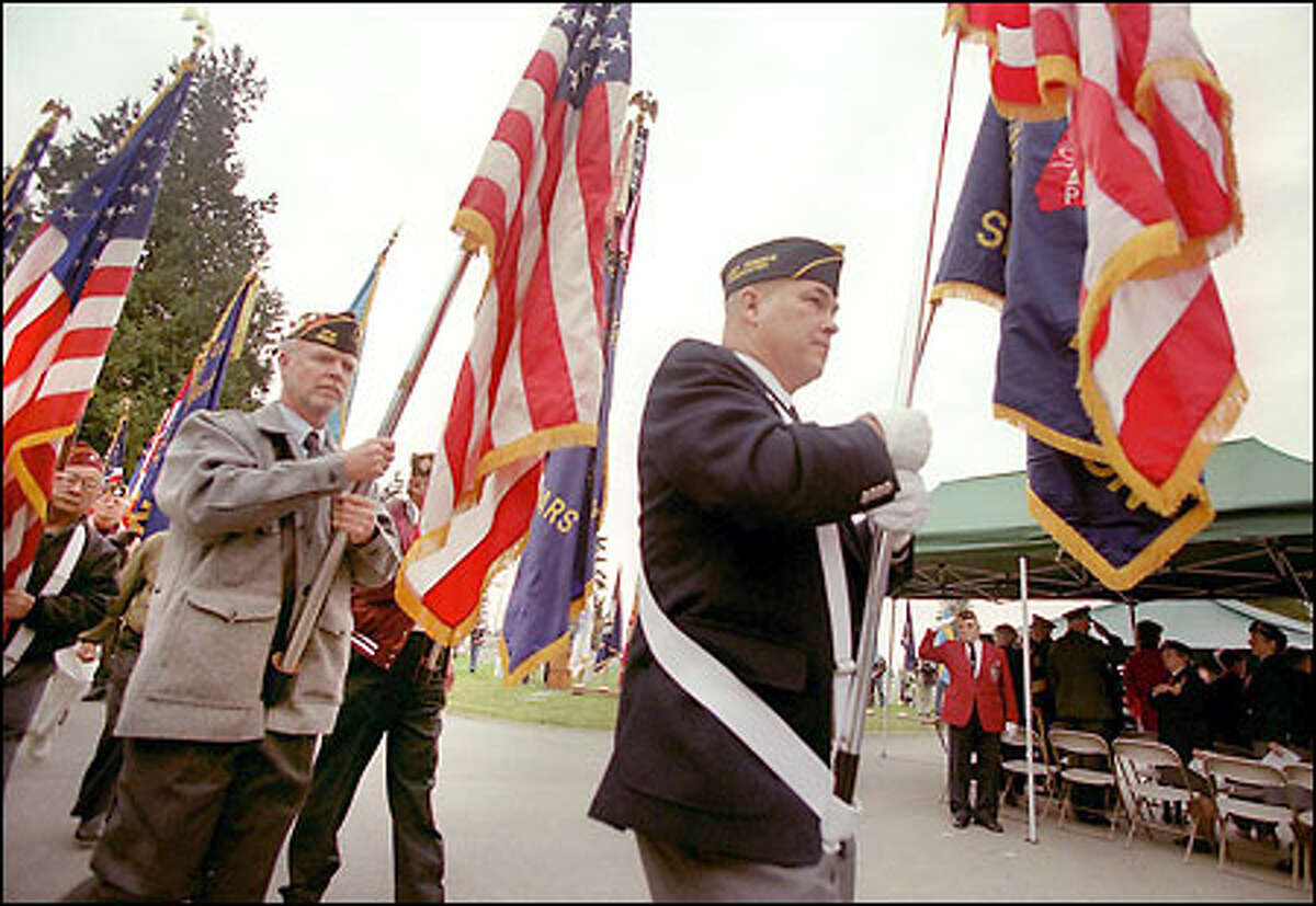 The Parade of Colors starts off Sunday's 52nd Annual Veterans Day Service of Remembrance at Evergreen-Washelli Memorial Park in north Seattle.
