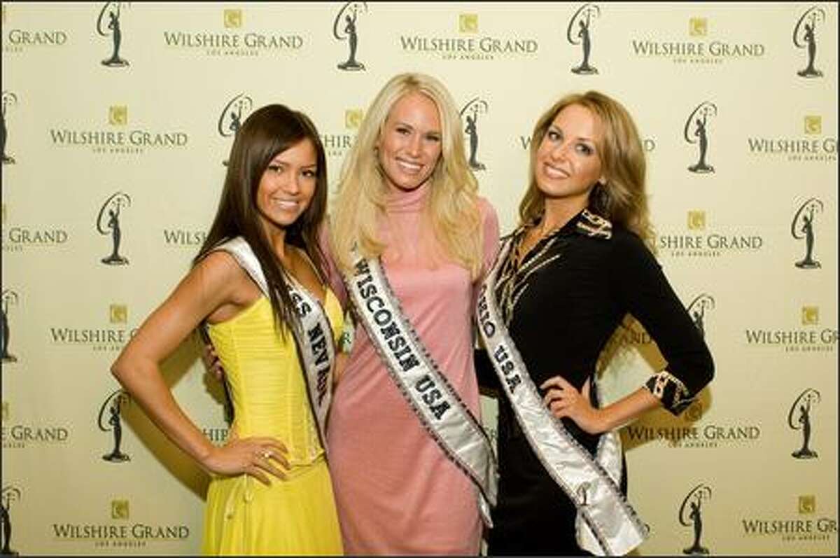 Helen Salas, Miss Nevada USA 2007, Caitlin Shea Morrall, Miss Wisconsin USA 2007, and Anna Melomud, Miss Ohio USA 2007, pose at the Wilshire Grand Hotel in Los Angeles on March 8 before registration and fittings for the Miss USA 2007 competition.