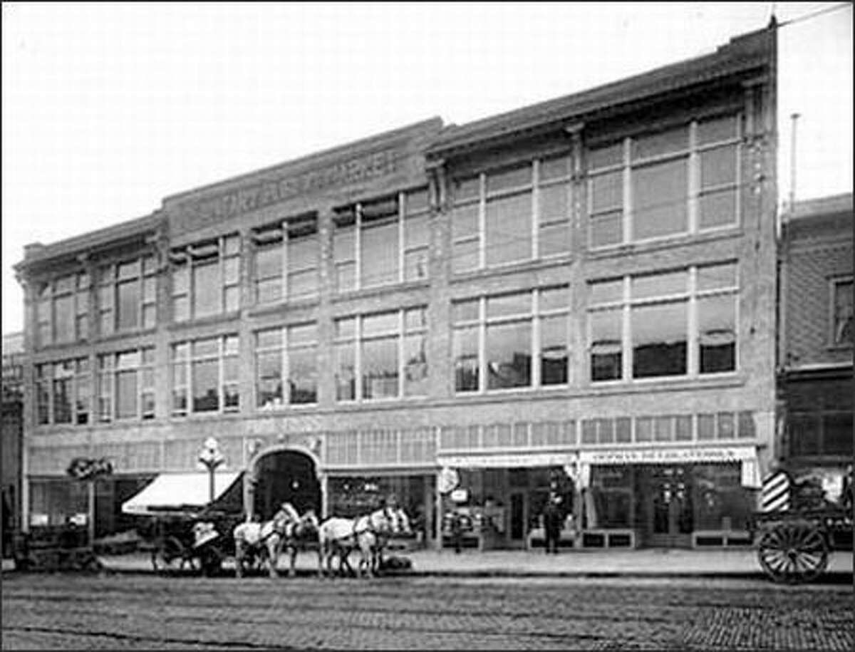 Seattle's Sanitary Public Market was built on First Avenue, near Pike Street, in 1909-1910. Some people said that the building got its name because horses were not allowed inside. The market building was destroyed by fire in 1941, and has since been rebuilt.