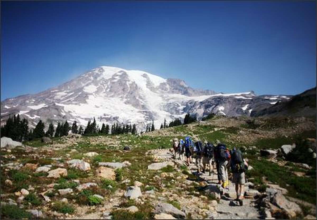 Climbers head out from Paradise, then a summit attempt, on their way to Camp Muir on Tuesday, August 22, 2006.